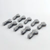A collection of black and silver quick solderless wire tap connectors for low voltage applications.