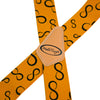 Orange elastic suspenders with a tan leather patch featuring the MeloTough logo