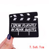 Black embroidered iron-on letter patch with white lightning bolt design and text that reads Speak fluently in movie quotes