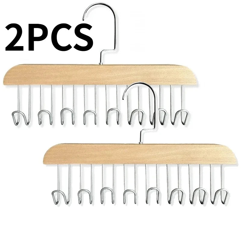 Two wooden hanging clothes racks with multiple metal hooks each.
