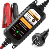 A black 12V automatic battery charger and maintainer unit with attached cables and battery clamps.
