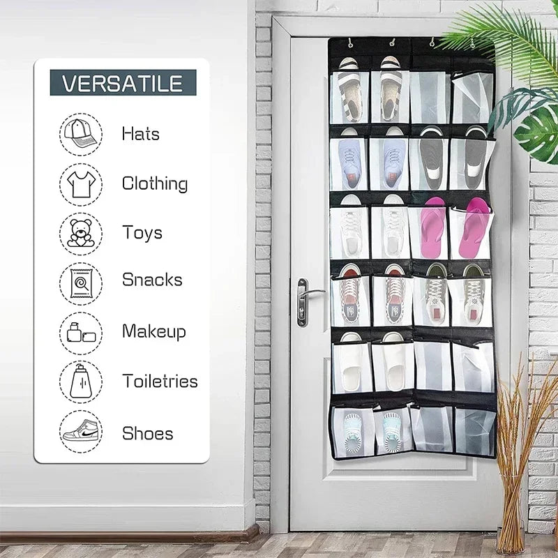 A versatile over-the-door mesh shoe organizer with hanging pockets displayed next to a white door.