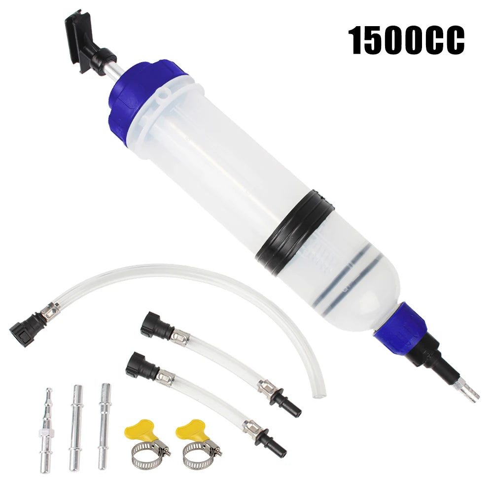 A clear plastic syringe with a blue tip and black cap, along with associated tubing and fittings for manual fuel transfer or 
