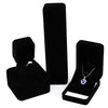 Elegant black velvet jewelry storage and gift box with a hinged lid displayed on a white background.