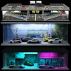 A detailed 1:64 scale miniature garage diorama kit featuring various cars and lighting elements.
