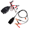 An OBD2 battery memory saver tool with a digital display and attached pliers.