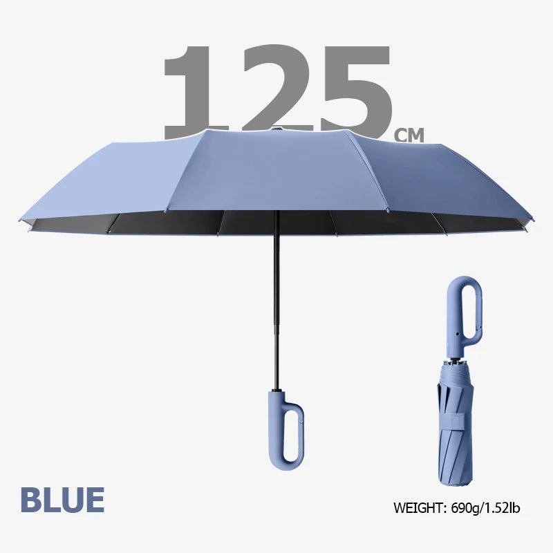 Blue windproof reverse folding umbrella with a reflective stripe and carabiner handle