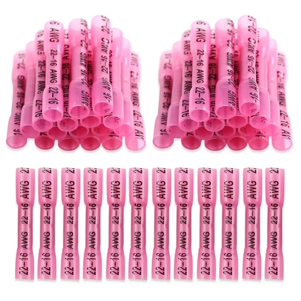 A collection of pink insulated waterproof heat shrink butt connectors for 22-16 AWG wires.