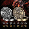 A silver dragon-themed pocket watch case and gold dice set with various metal polyhedral dice.