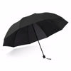 A black oversized folding umbrella is shown open against a white background.