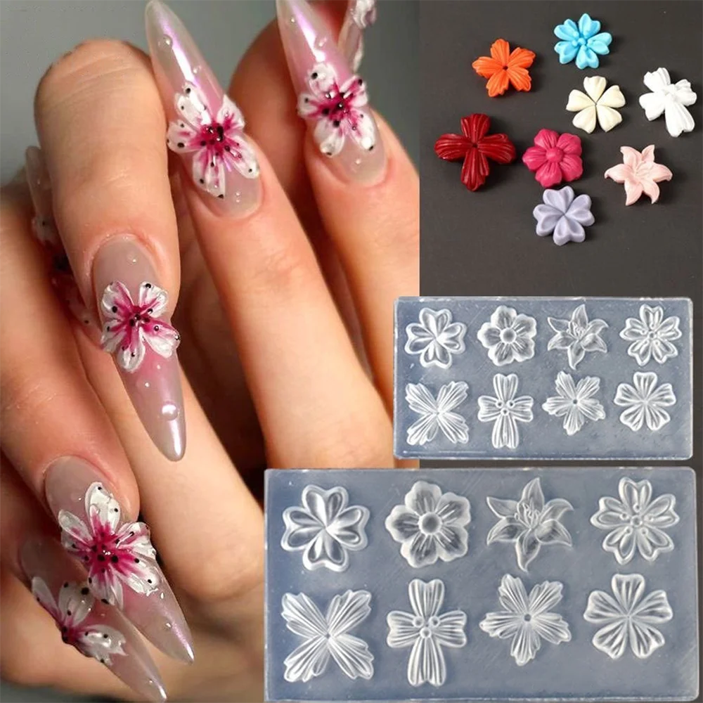A hand displays various silicone molds for 3D lily nail art, featuring floral shapes in pink, white, and purple shades.