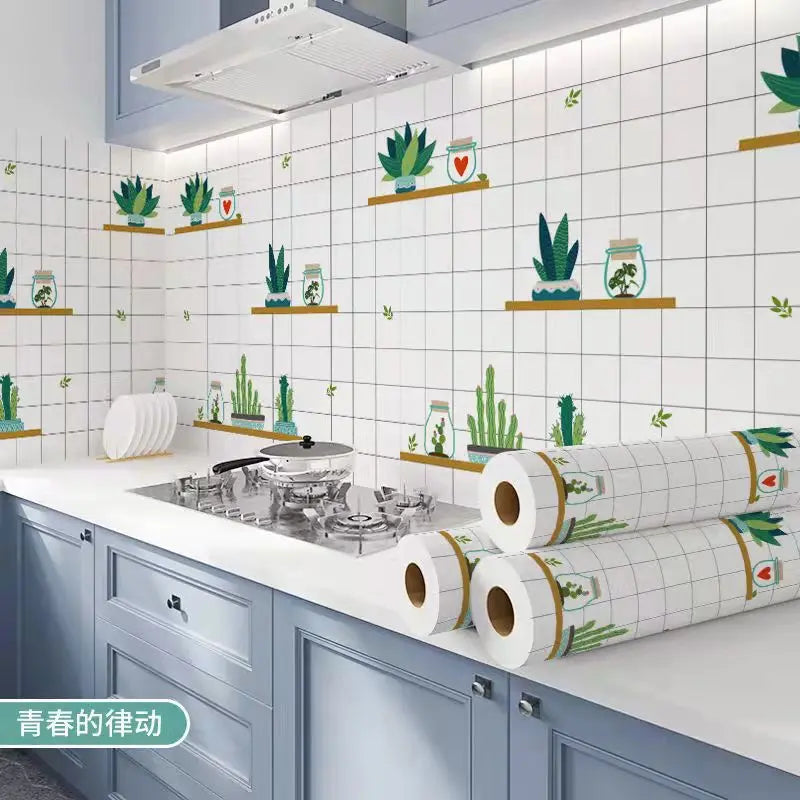 A kitchen splashback featuring a white tile pattern decorated with green succulents and small hearts on wooden shelves.