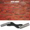 A professional brick jointer tool with a cast aluminum handle shown against a red brick background.