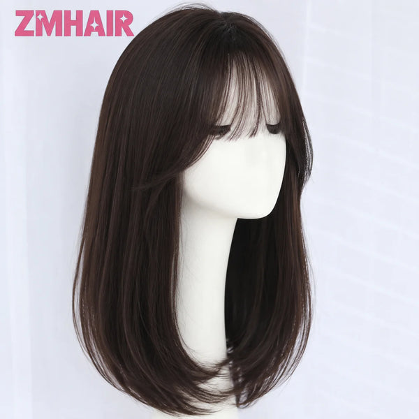 A dark brown straight hair wig displayed on a mannequin head.