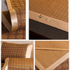 A folded double-sided cooling mat with a beige pillowcase and woven texture.