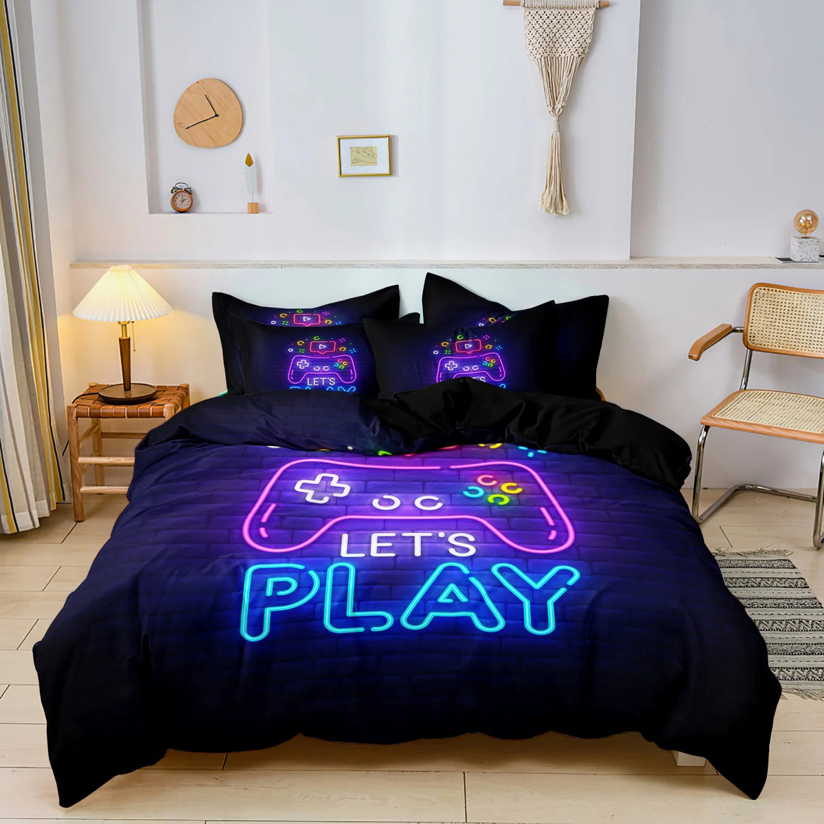 A dark blue duvet cover featuring a neon sign graphic that reads LET'S PLAY on a gamer controller and keyboard theme.