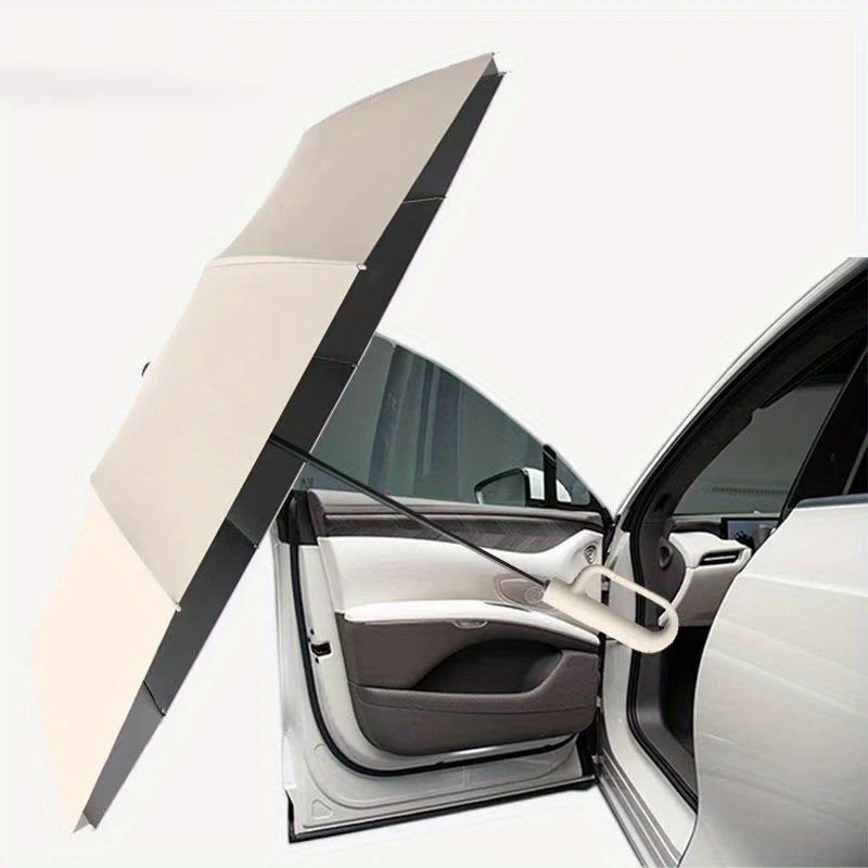 A white windproof automatic folding umbrella is shown open inside a car door.