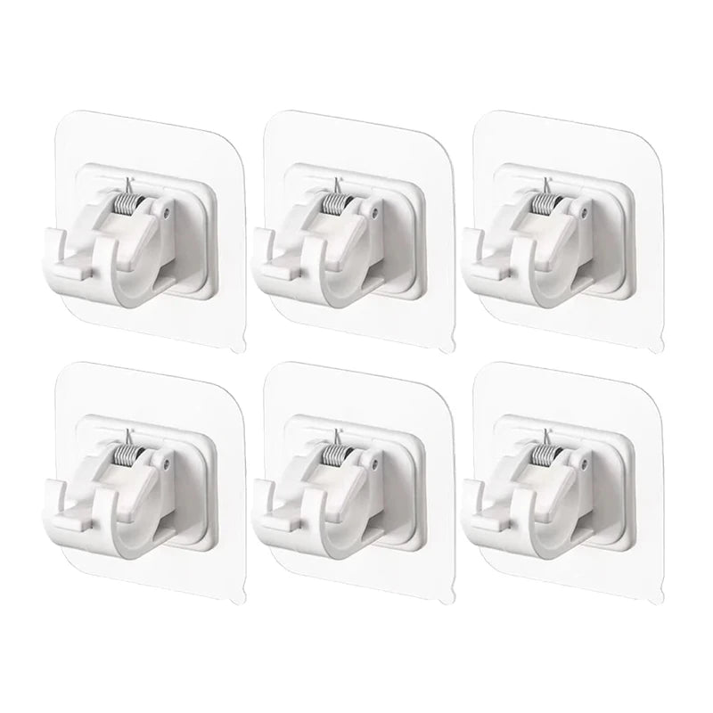 A set of white adhesive curtain rod hooks designed as a nail-free clamp for showers and storage.