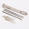 A set of silver leather sewing awls with replaceable needles displayed on a white background.