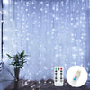 USB fairy string lights with remote control showing a string of bright white lights against a sheer curtain backdrop