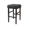 A dark brown bar stool slipcover made of stretchy jacquard fabric with an elastic edge.
