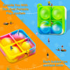 A colorful silicone pop keychain fidget toy in green and yellow, shown alongside a yellow cube version.