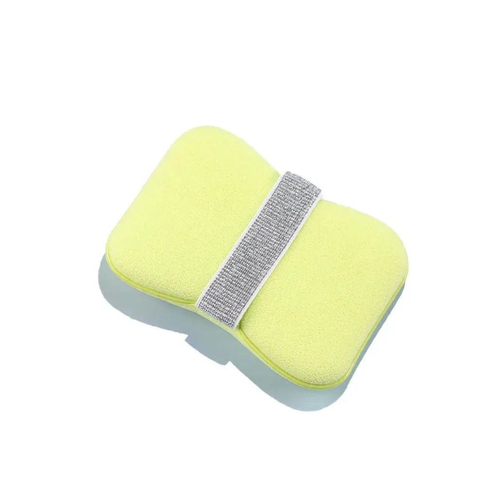 A bright yellow foaming soap saver bag with a gray exfoliating mesh strip.