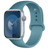 A light blue silicone sport band for an Apple Watch displayed on a white background.