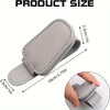 A light gray magnetic leather sunglasses holder showing its size and how it fits on a hand.