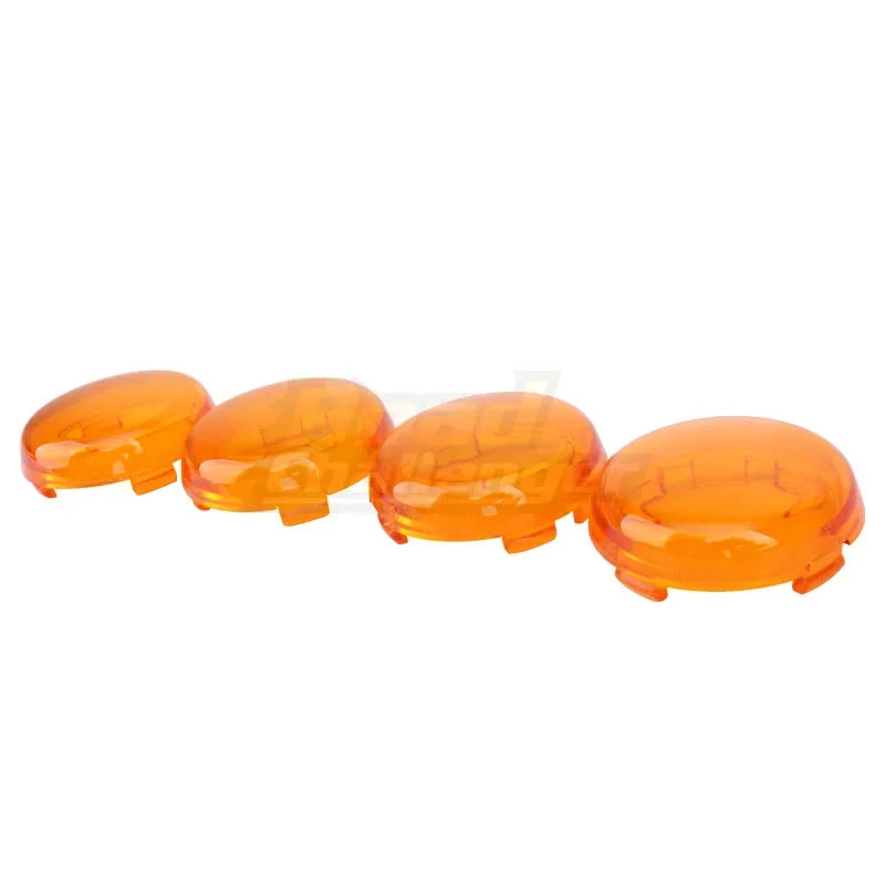 A set of amber LED turn signal light lens covers for Harley Davidson motorcycles.
