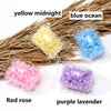 Assortment of yellow midnight, blue ocean, red rose, and purple lavender water-soluble laundry fragrance beads