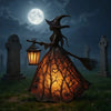 A witch figure in a dress with a broom and an illuminated lantern stands in a dark, grassy field under a full moon.