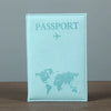 Light blue leather passport holder featuring a world map design and an airplane icon.