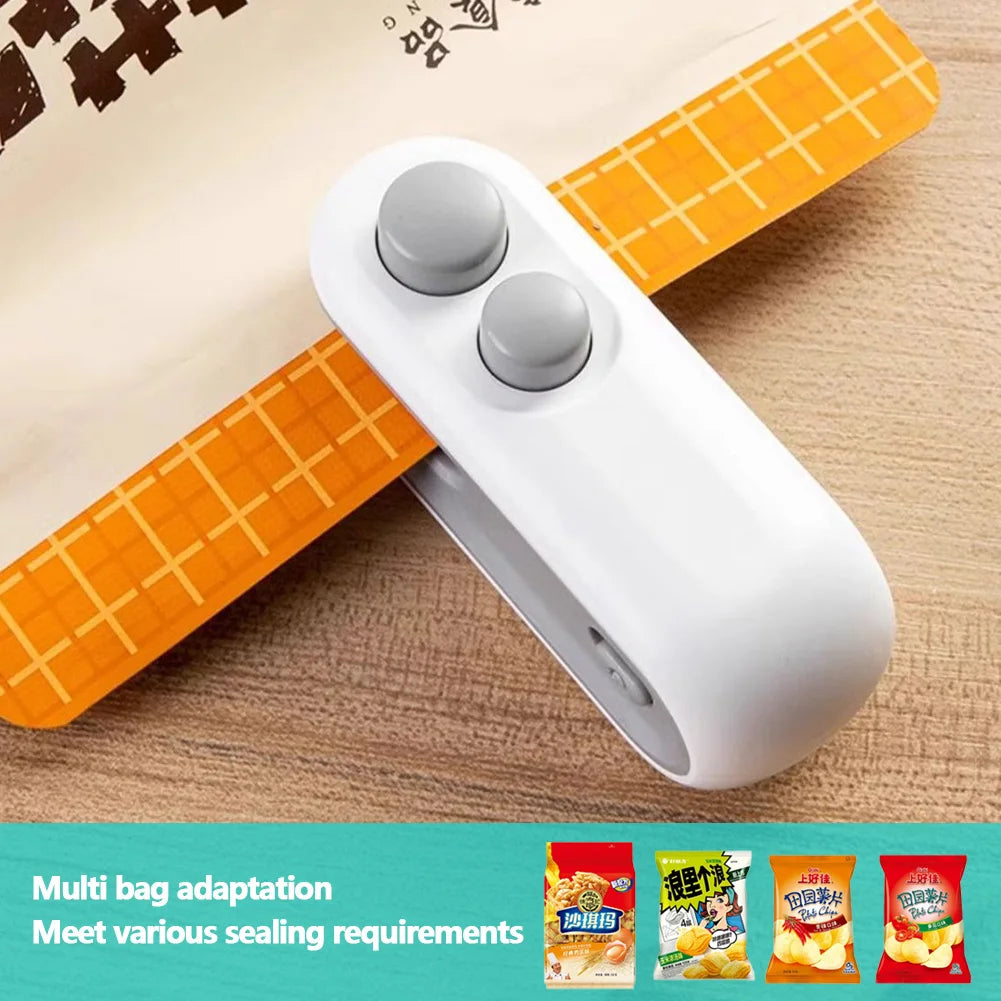A white portable 2-in-1 bag sealer and cutter device shown on a light background.