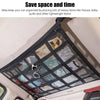 A black mesh car ceiling cargo net used as an overhead storage organizer for keeping messy items organized.