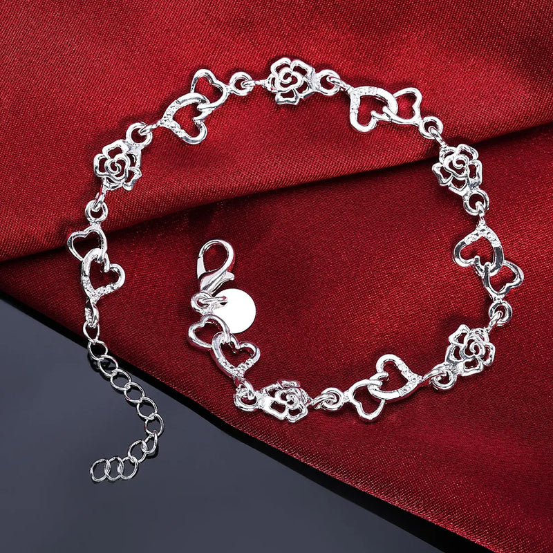 Pulsera de Cadena Corazón y Flor en Plata de Ley