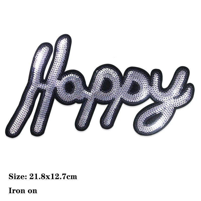 Iron-on patch featuring the word Happy in glittery sequins for DIY clothing and accessories