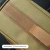 Close-up of a beige canvas storage bag with reinforced stitching and a tan strap.