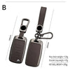 A dark brown durable alloy key case cover for a car, shown with attached chain and bracelet.