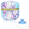 A round, light blue and purple refillable loose powder container with a gold rim and a white fluffy puff.