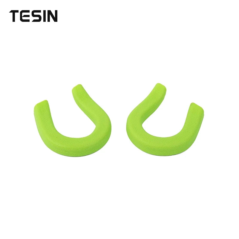 A pair of bright lime green front bumper tow hook covers for Chevrolet Silverado and GMC Sierra trucks.