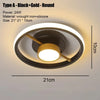 A round black and gold LED ceiling light fixture with a warm glow.