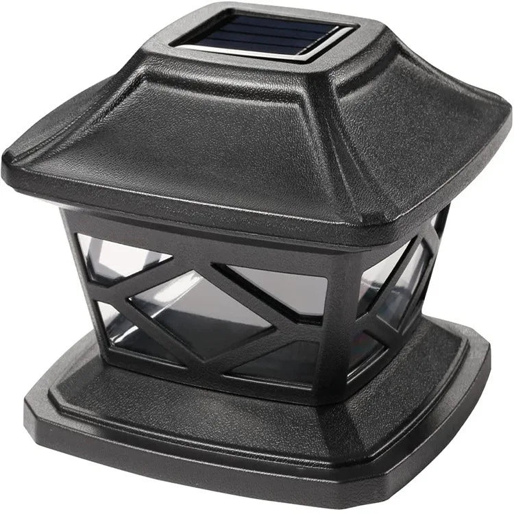 A black solar post cap light with a glass lens and warm LED for outdoor lighting.