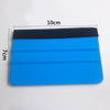 A blue squeegee with a black felt pad used for car vinyl wrap and window tint installation.