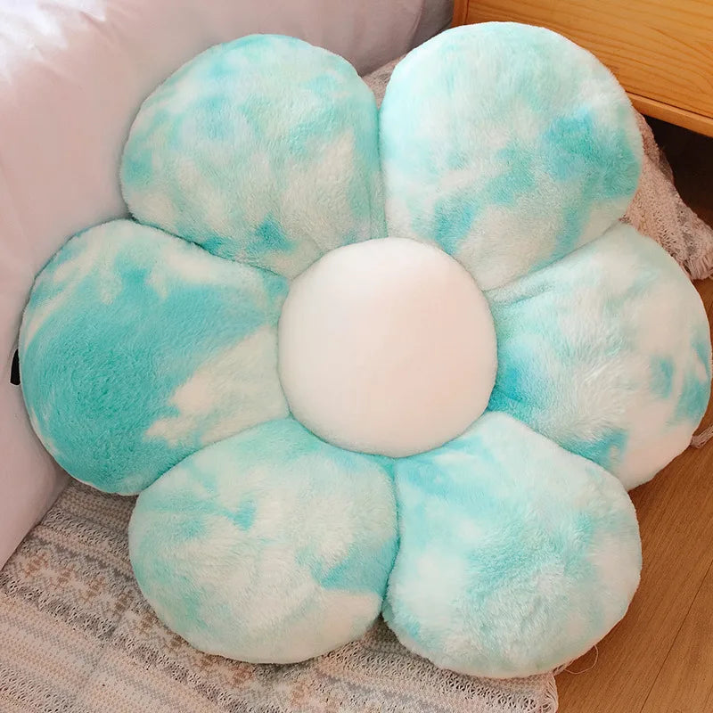 A cluster of light blue and white fluffy sunflower-shaped plush pillows for home decor