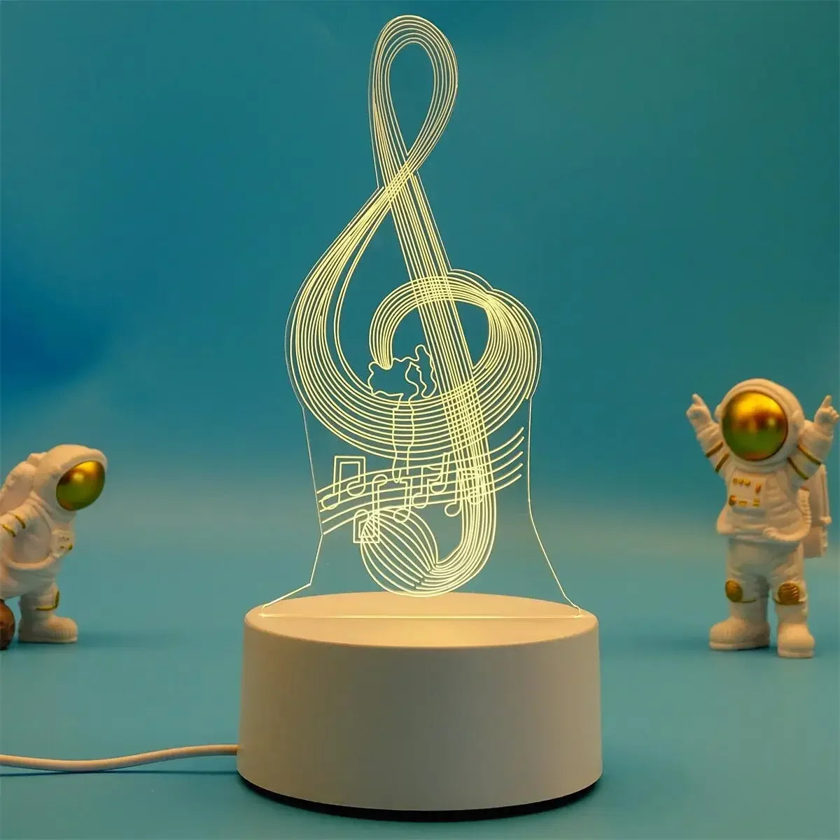 A glowing outline of a treble clef is displayed on a white base, set against a blue background.