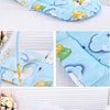 Light blue foldable baby mosquito net with a mattress, pillow, and floral pattern.