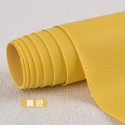 A roll of yellow self-adhesive PU leather patch for furniture and craft repairs.