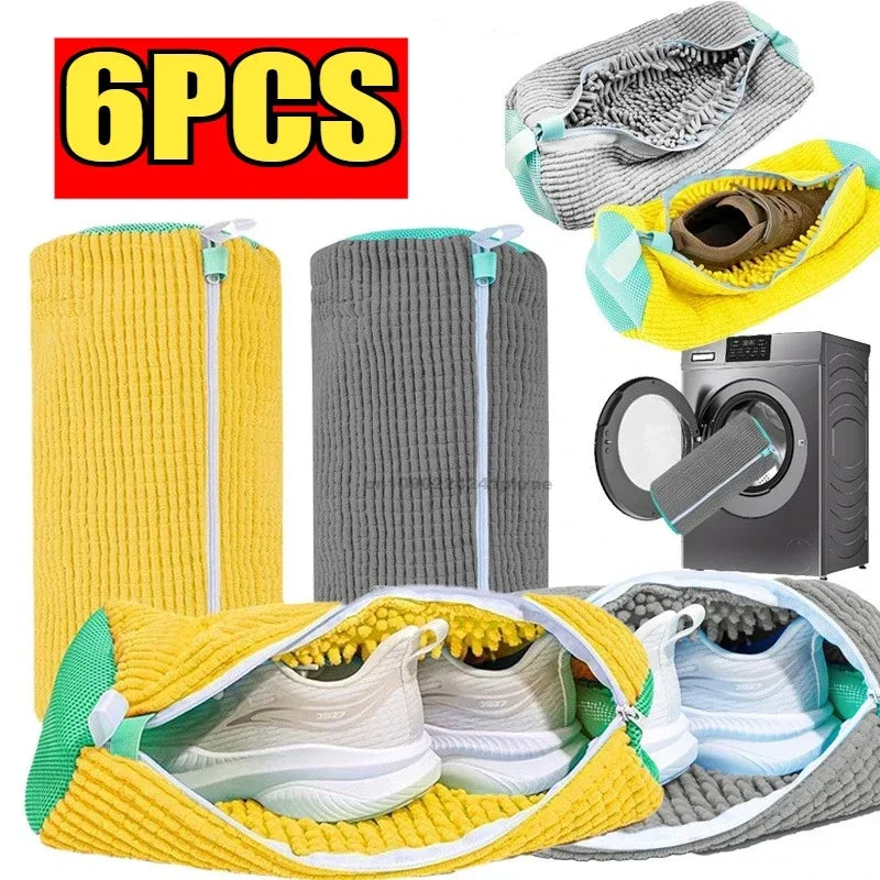 Six yellow and gray laundry bags filled with shoes for washing machine use