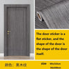 A vertical gray wood grain door featuring a self-adhesive sticker design.